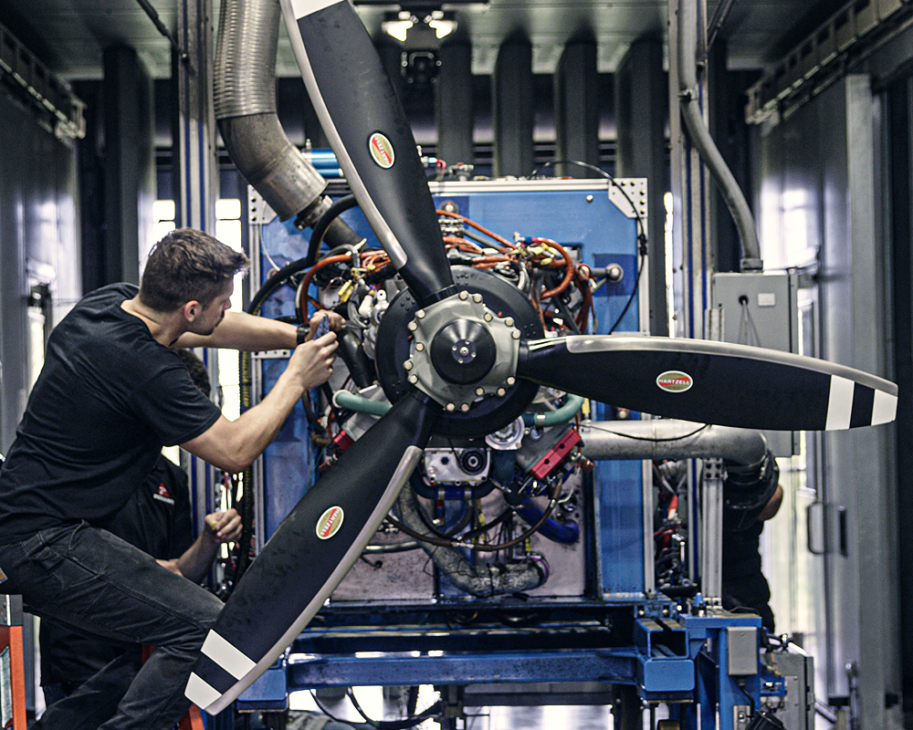 DeltaHawk technician working on engine